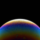 Illustration for article titled Photos of Soap Bubbles that Look Like Trippy Exoplanets